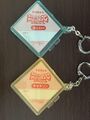 Yoshi and Birdo keychains (back)